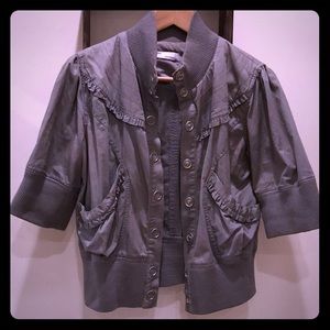 Adorable bomber style jacket with ruffle detail!